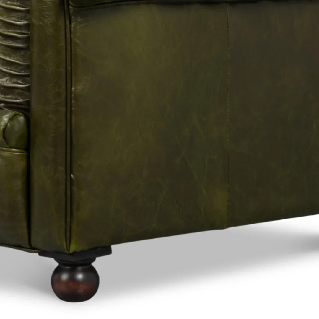 Poltrona Chesterfield verde capitonné