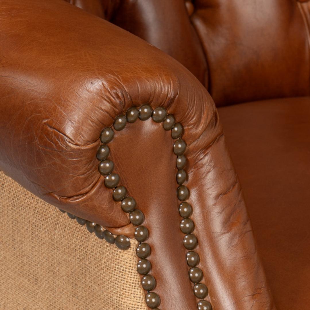 Poltrona vintage in pelle avana e iuta trapuntata