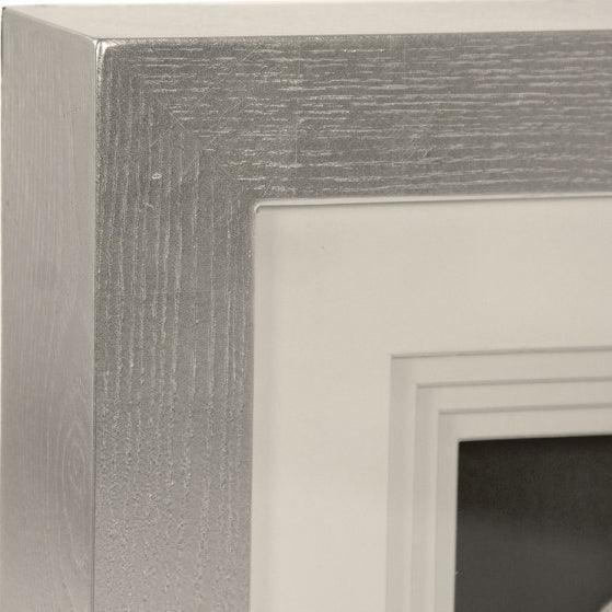 Arte floreale in ceramica bianca incorniciata