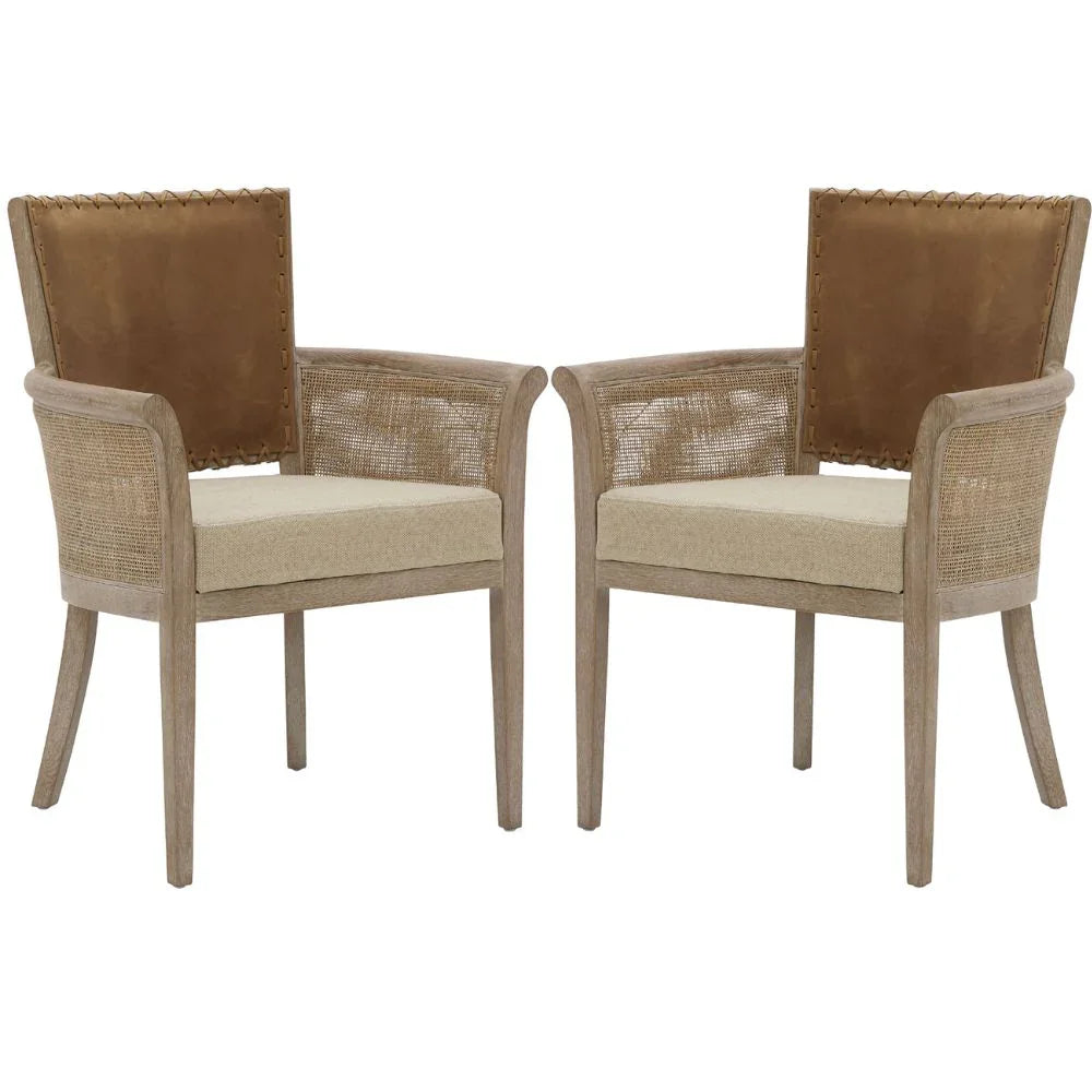 Poltrona con braccioli in canna e schienale in pelle cucita