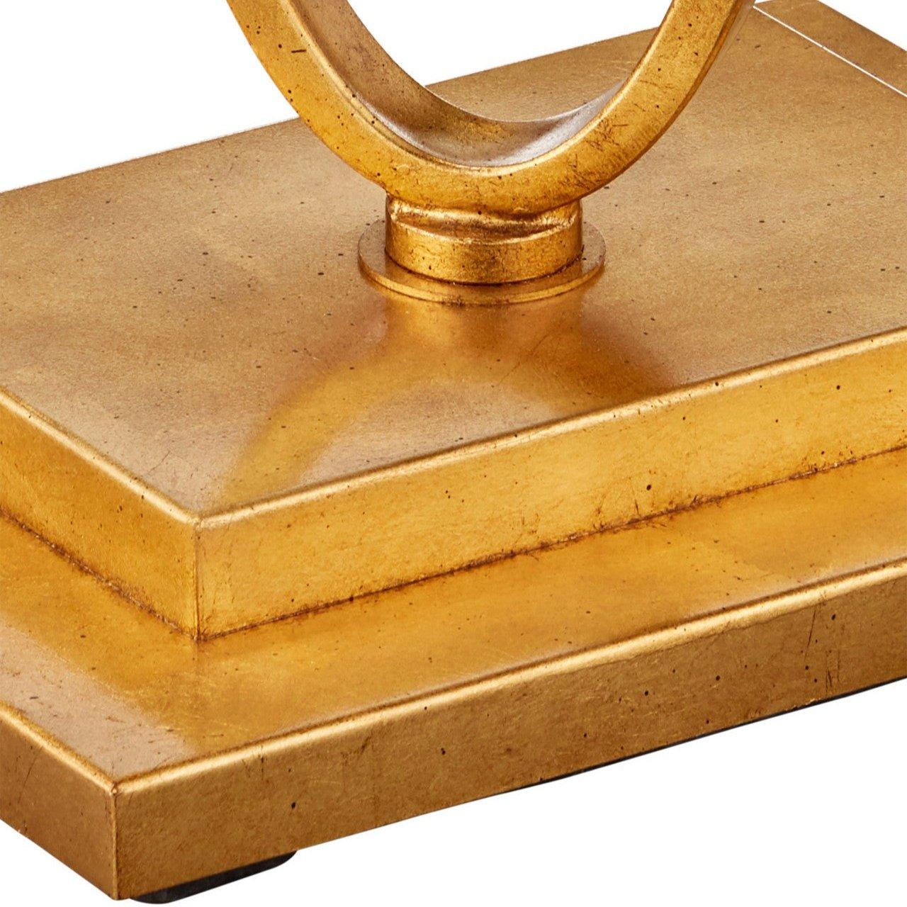 Tavolino con gambe a bracciale in oro