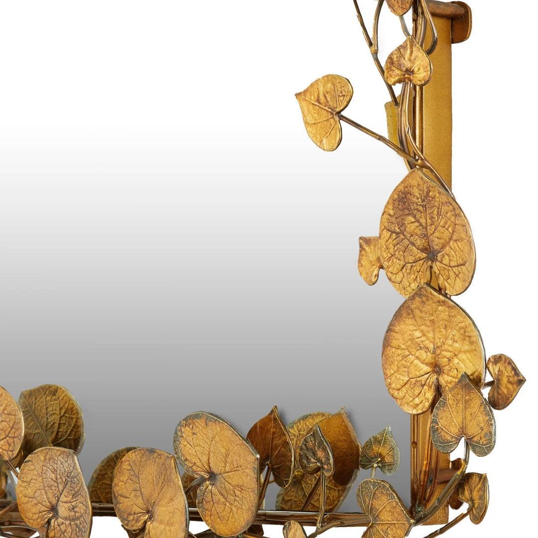 Specchio con foglie in ottone arcuate
