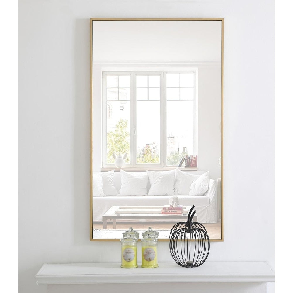 Specchio rettangolare con cornice in metallo Carson Carrington Salsnas