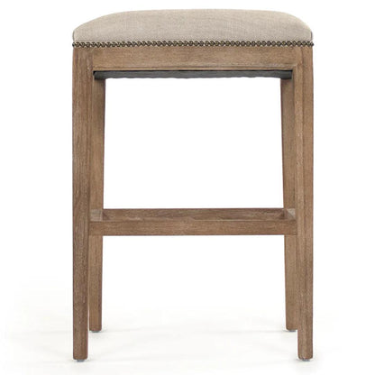 Sgabello da bar Cora con finiture a borchie