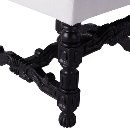 Sedia imbottita con base spessa e intagliata