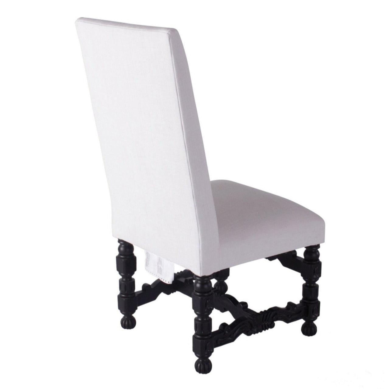 Sedia imbottita con base spessa e intagliata