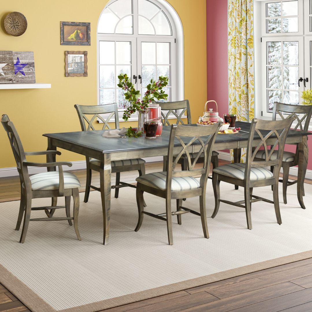 Sedia da pranzo imbottita in legno massello con schienale a doppia X