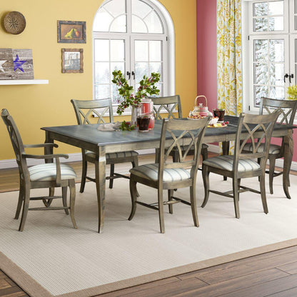 Sedia da pranzo imbottita in legno massello con schienale a doppia X