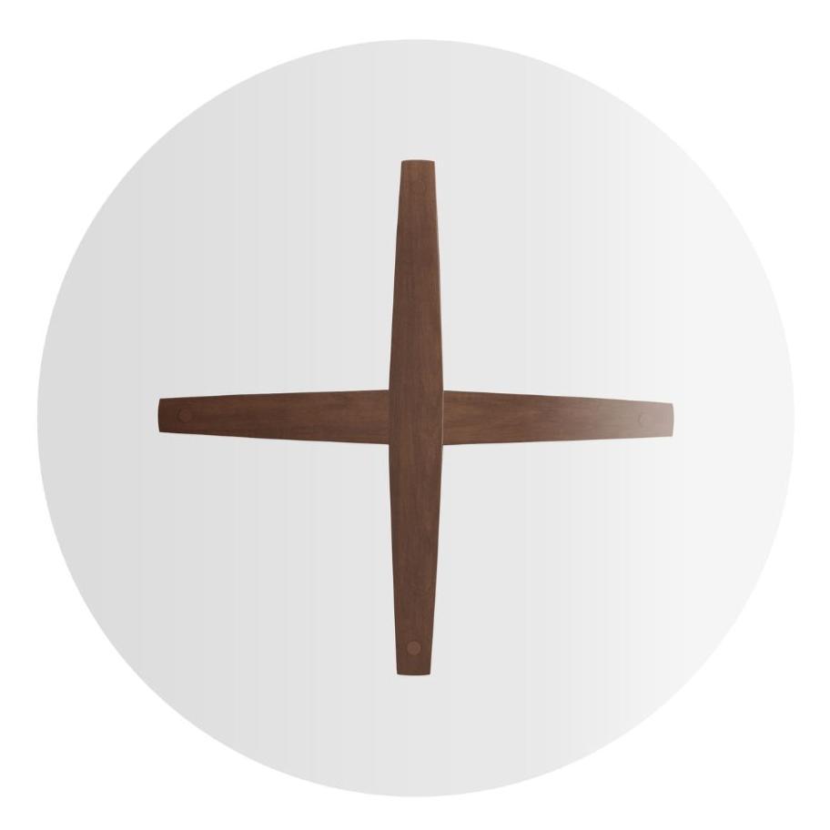 Tavolo da pranzo moderno con gambe a ragno e piano in vetro