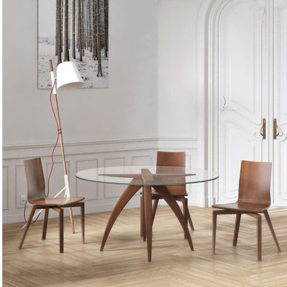 Tavolo da pranzo moderno con gambe a ragno e piano in vetro