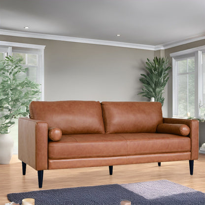 Divano moderno in vera pelle con gambe in legno e cuscino di supporto aggiuntivo