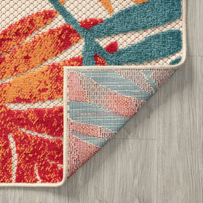 Tappeto da interno/esterno con motivo floreale costiero di origine.