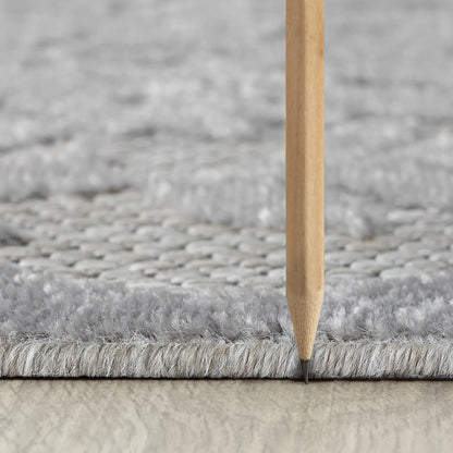 Tappeto da interno/esterno con motivo floreale costiero di origine.