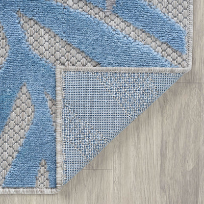 Tappeto da interno/esterno con motivo floreale costiero di origine.