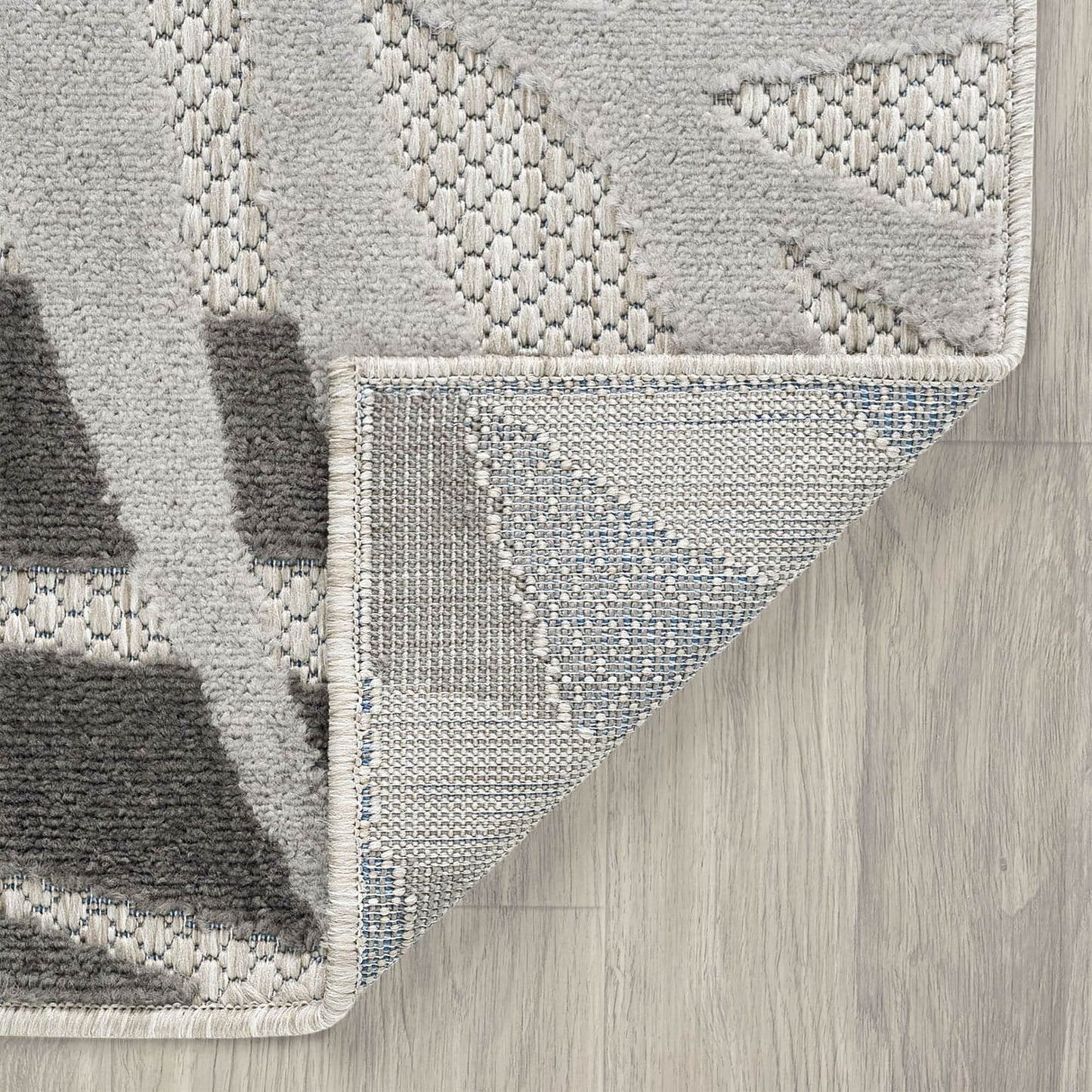 Tappeto da interno/esterno con motivo floreale costiero di origine.