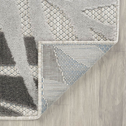 Tappeto da interno/esterno con motivo floreale costiero di origine.