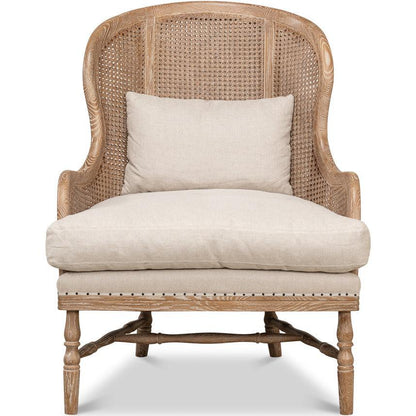 Poltrona in rattan con schienale tondo