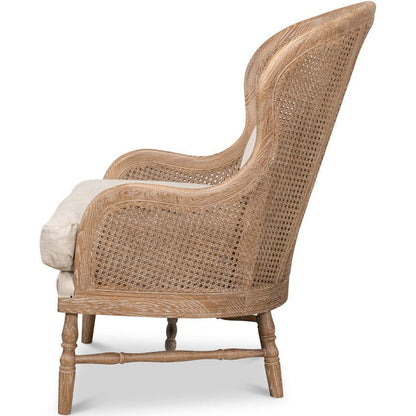 Poltrona in rattan con schienale tondo