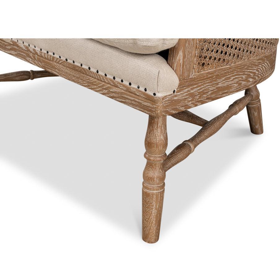 Poltrona in rattan con schienale tondo