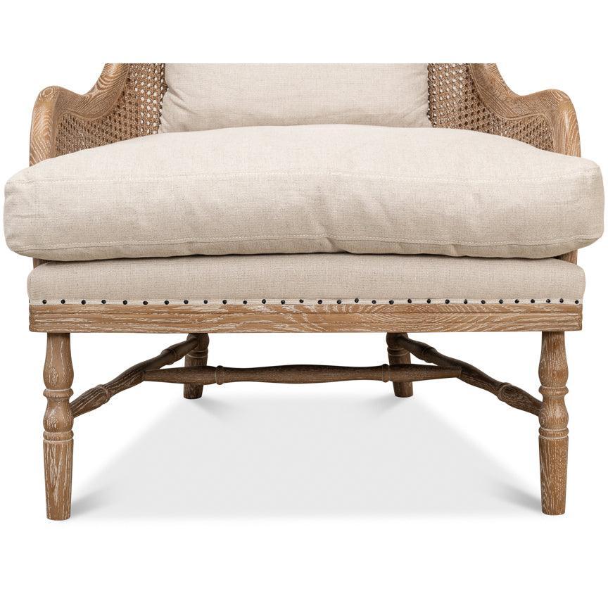 Poltrona in rattan con schienale tondo