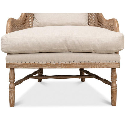 Poltrona in rattan con schienale tondo