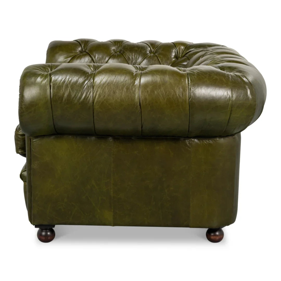 Poltrona Chesterfield verde capitonné