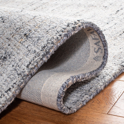 Tappeto moderno in viscosa corallo astratto fatto a mano SAFAVIEH