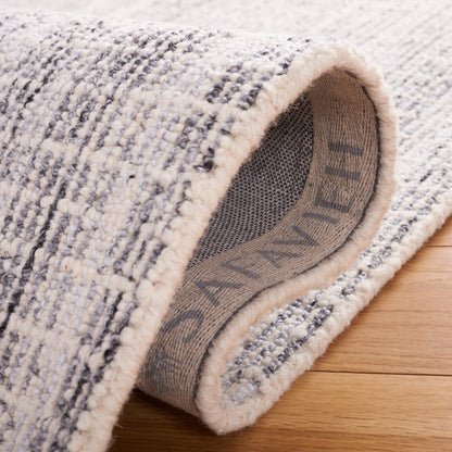 Tappeto moderno in lana Maggy astratto fatto a mano SAFAVIEH