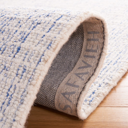 Tappeto moderno in lana Maggy astratto fatto a mano SAFAVIEH