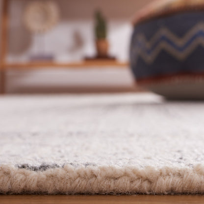 Tappeto moderno in lana Maggy astratto fatto a mano SAFAVIEH