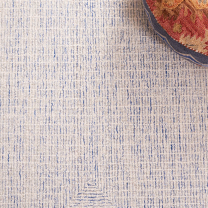 Tappeto moderno in lana Maggy astratto fatto a mano SAFAVIEH