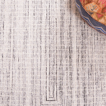 Tappeto moderno in lana Maggy astratto fatto a mano SAFAVIEH