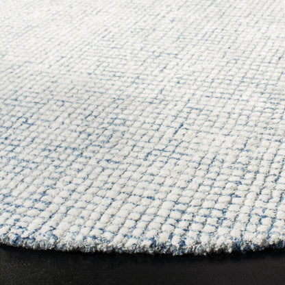 Tappeto moderno in viscosa Marikka astratto fatto a mano SAFAVIEH