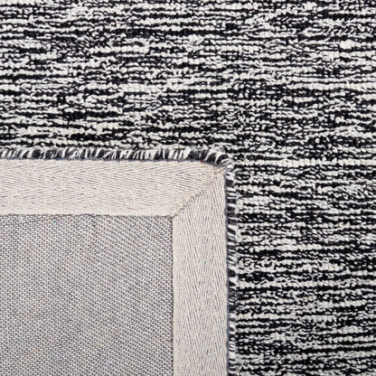 Tappeto moderno in lana Sofoula astratto fatto a mano SAFAVIEH