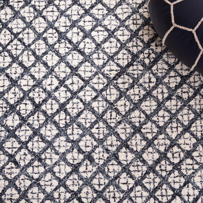 Tappeto moderno in lana Suhad astratto fatto a mano SAFAVIEH