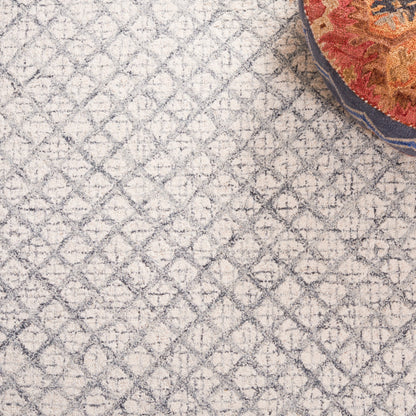 Tappeto moderno in lana Suhad astratto fatto a mano SAFAVIEH