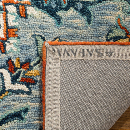 Tappeto in lana con medaglione Boho Aspen Hagar fatto a mano SAFAVIEH