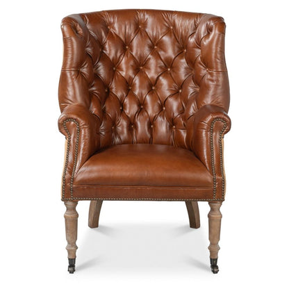 Poltrona vintage in pelle avana e iuta trapuntata