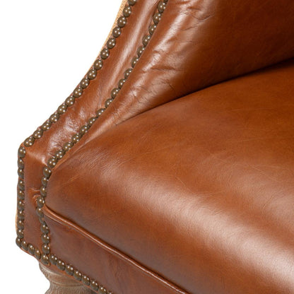 Poltrona vintage in pelle avana e iuta trapuntata