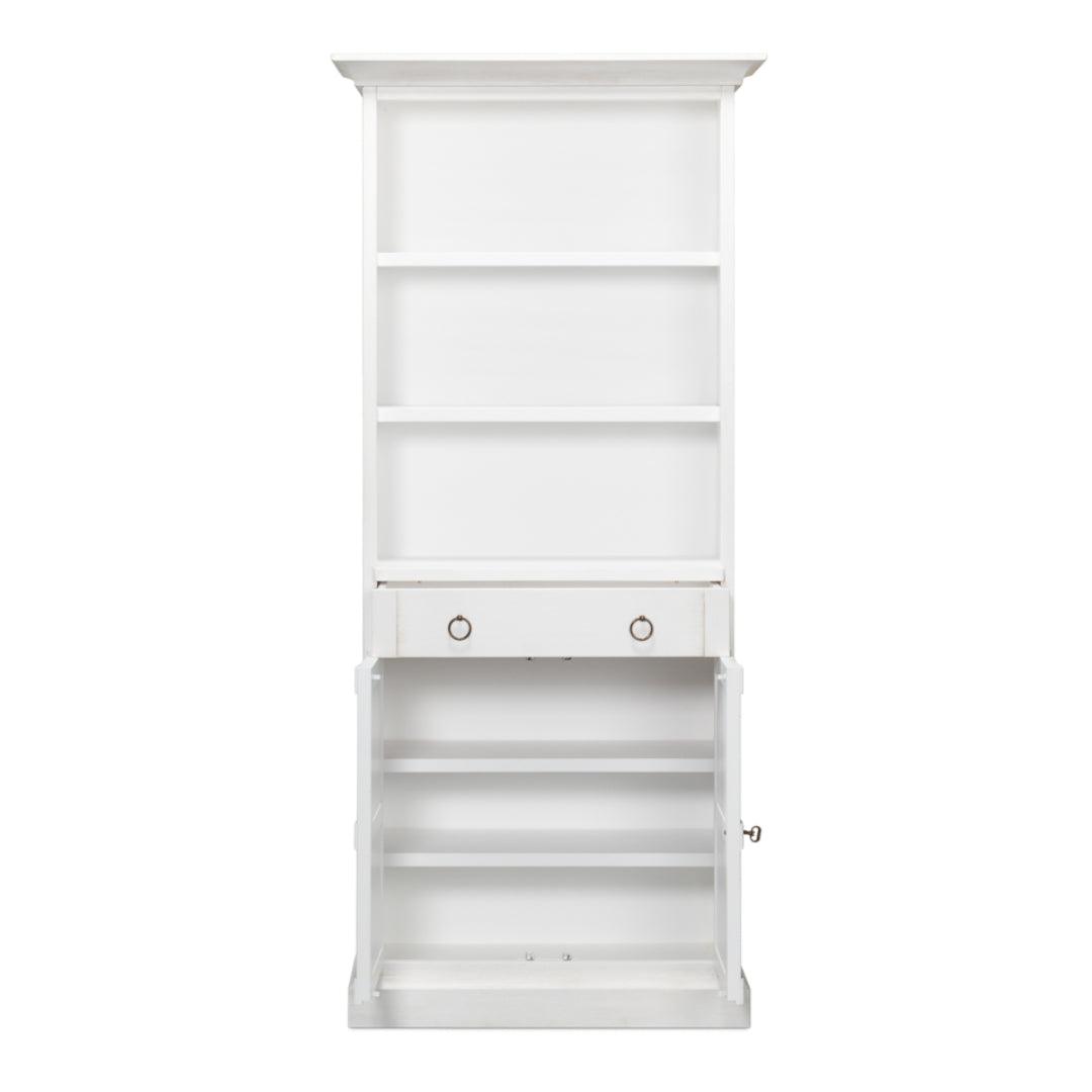 Libreria bianca con ante e ripiani aperti