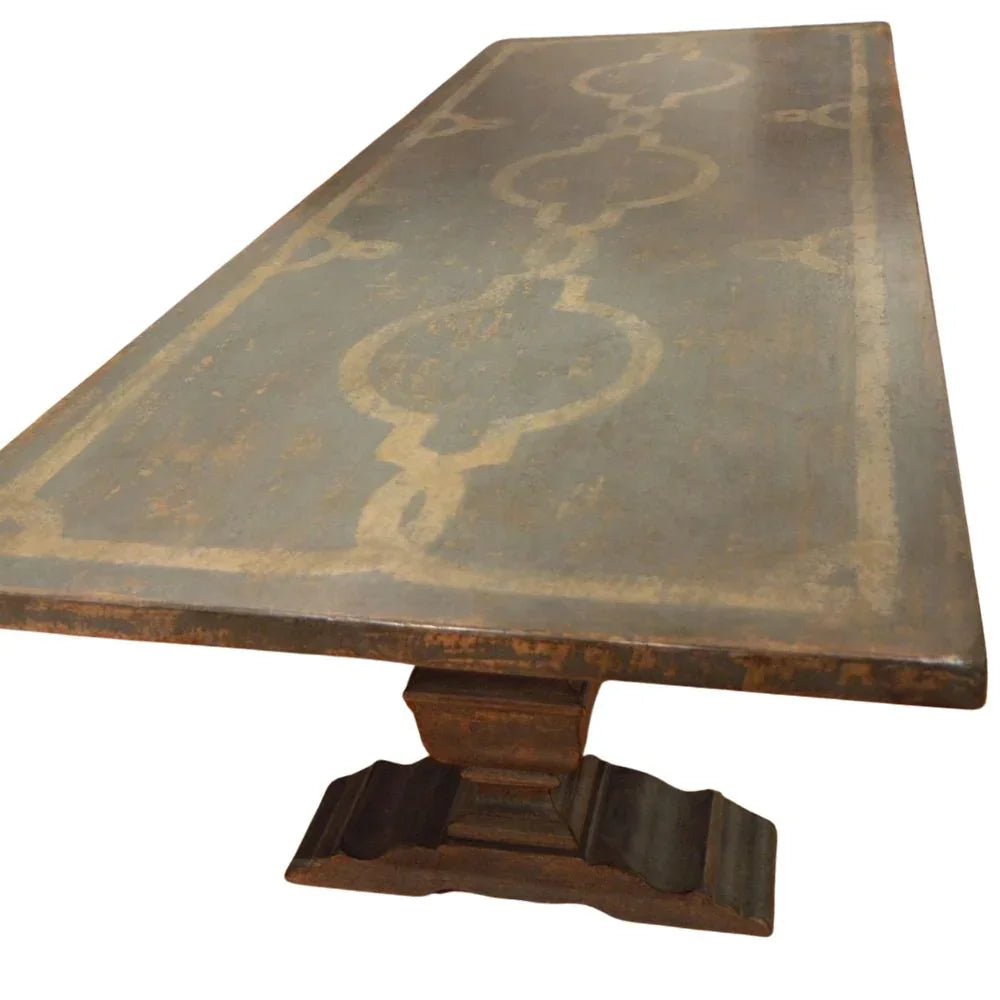 Tavolo da pranzo con piedistallo e motivo a volute