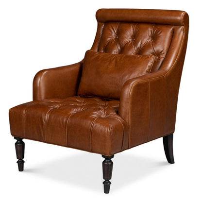 Poltrona capitonné in pelle marrone