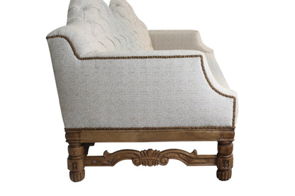 Divano con schienale trapuntato doppio cammello