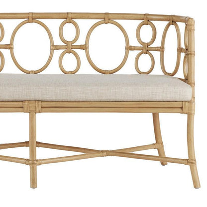 Panca in rattan con forme circolari curve