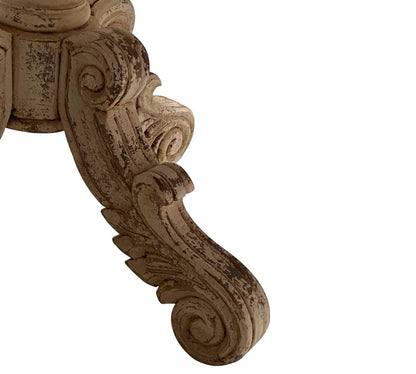 Tavolo da pranzo rotondo con volute francesi