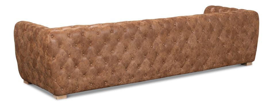 Divano in pelle trapuntata color marrone dorato