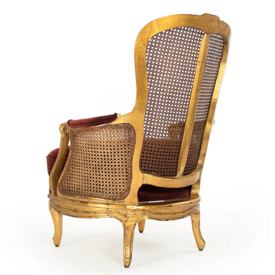 Lussuosa poltrona francese in canna dorata con cuscino in velluto rosso