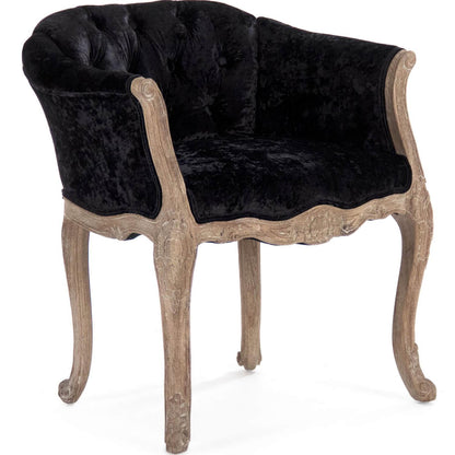 Poltrona in velluto nero trapuntato