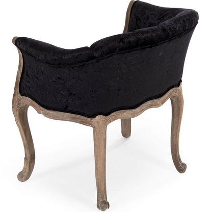 Poltrona in velluto nero trapuntato