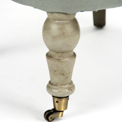 Poltrona pantofola trapuntata color salvia blu